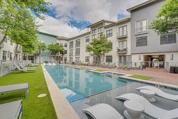 Swimming pool courtyard with modern apartment buildings